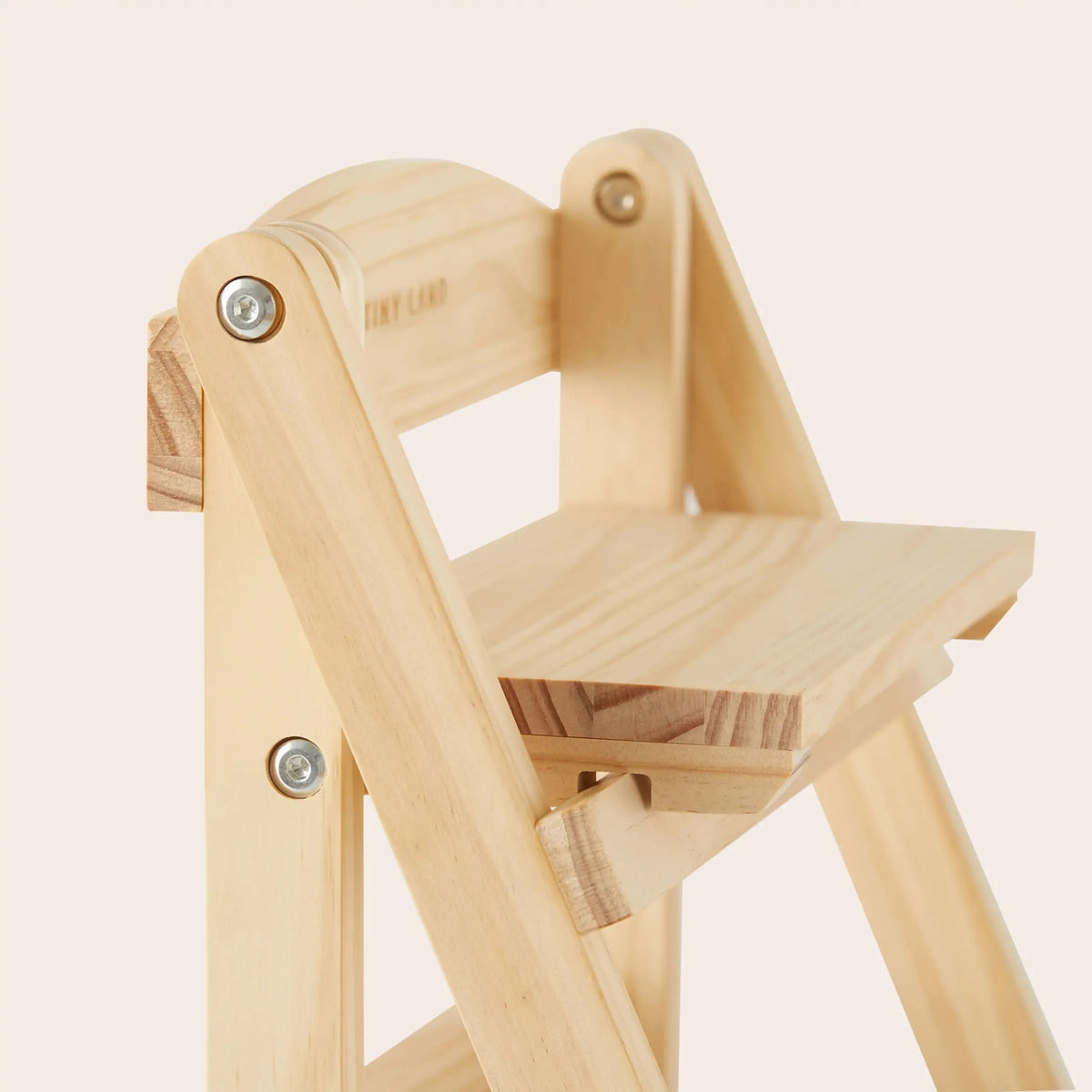 Natural wood play kitchen shelf featuring a sturdy design with a smooth finish. The light-colored wood complements a minimalist aesthetic, perfect for organizing children’s play food and accessories.
