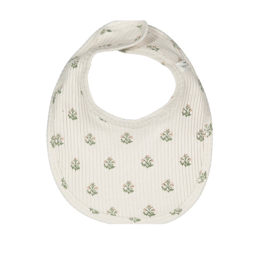 A cream cotton bib featuring a delicate floral print in green and soft pink, designed for infants.