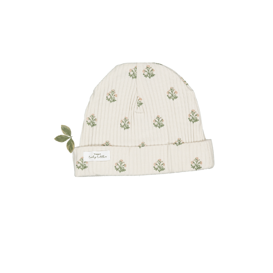 Cream-colored baby hat featuring delicate floral embroidery and a soft ribbed texture. Made from organic cotton, this hat is perfect for little ones to wear comfortably outdoors.