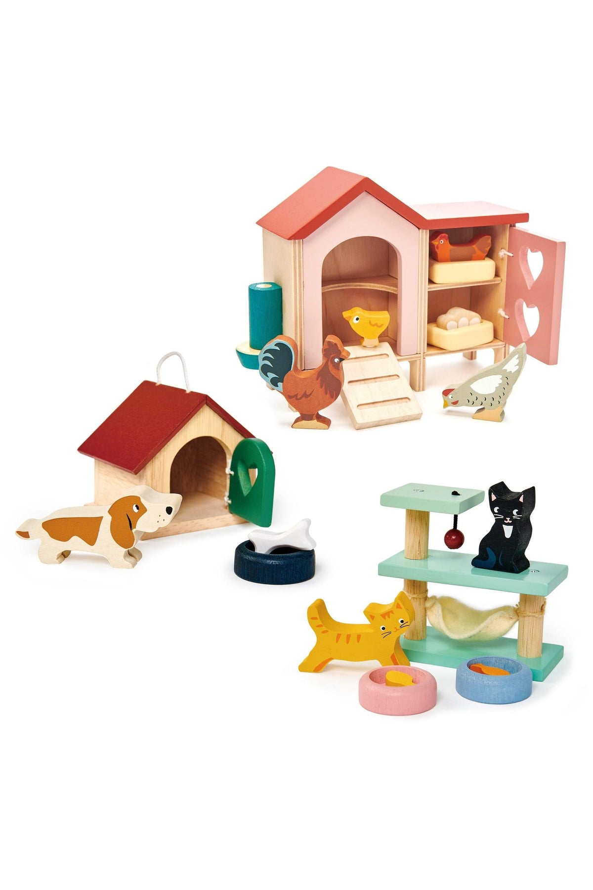 Colorful wooden pet playsets from Tender Leaf Toys, featuring a doghouse, animals, and feeding accessories for imaginative play.
