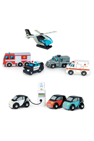 A colorful wooden toy set featuring a police helicopter, fire engine, ambulance, and electric smart cars with a charging station. Ideal for imaginative play, promoting sustainable materials and quality craftsmanship.