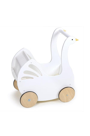 A charming white baby carriage shaped like a swan, featuring cutout details and smooth wooden wheels, perfect for toddlers to transport their dolls.