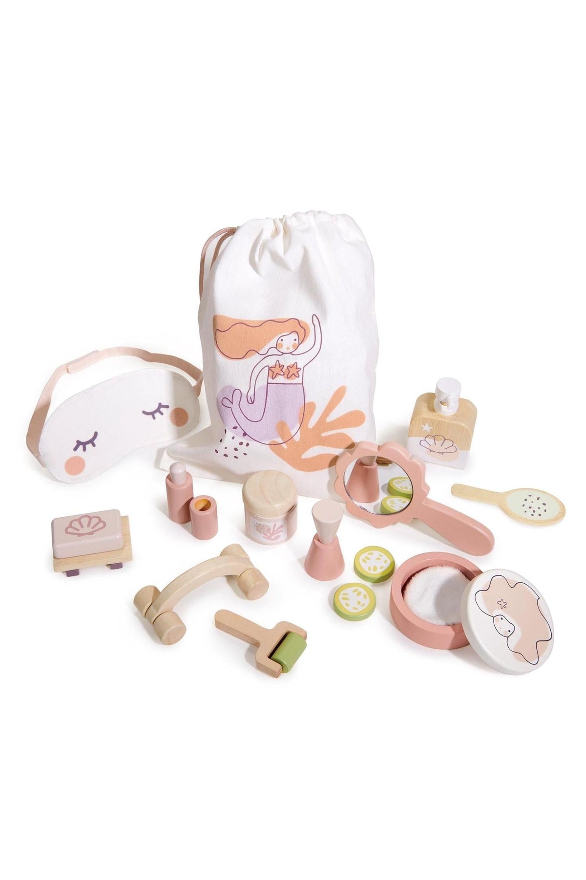 A spa retreat playset featuring wooden toys, including a jade roller, eye mask, and shell mirror, in a drawstring bag.