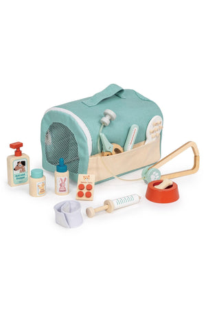 A teal soft carry case contains various wooden veterinary tools, including a stethoscope, thermometer, and syringe, designed for young animal lovers to engage in imaginative play as veterinarians.