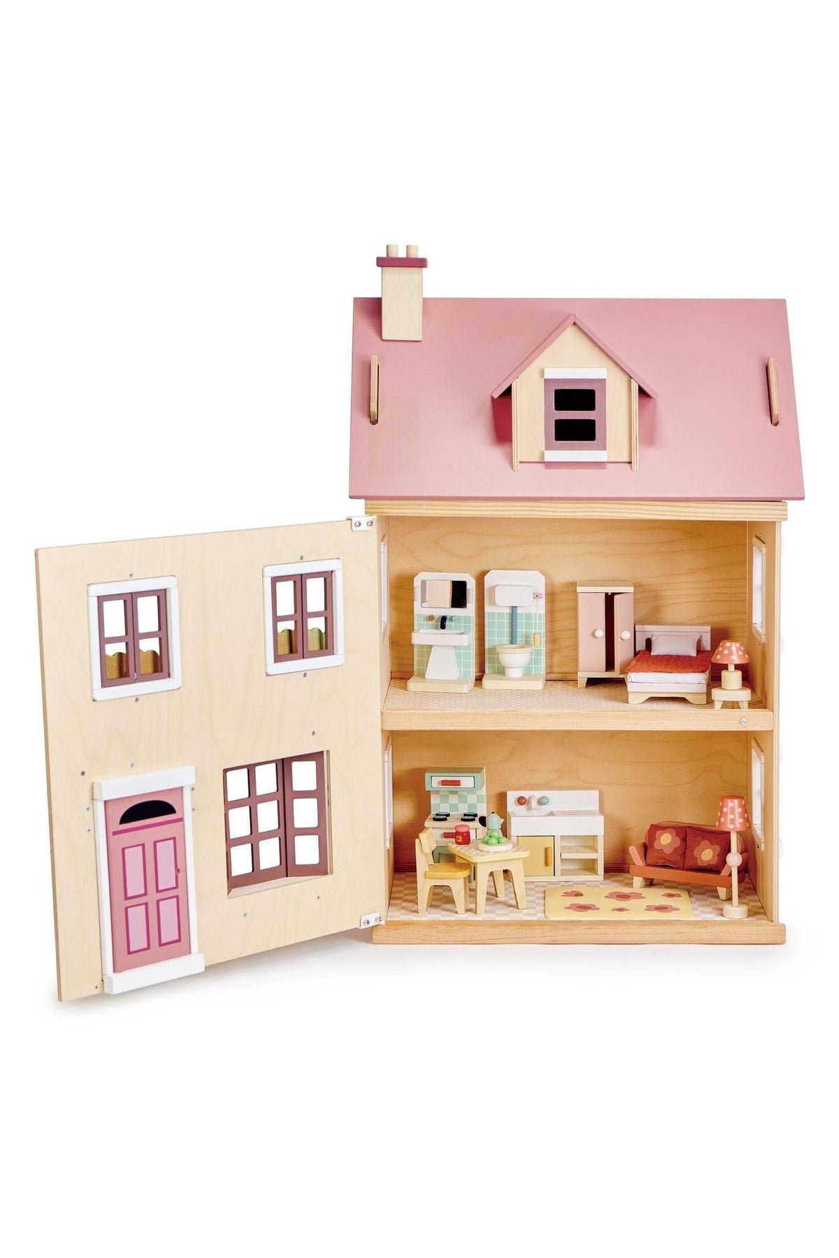 A colorful wooden dollhouse with a pink roof, featuring interior rooms furnished with miniature furniture.