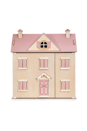 Wooden dollhouse with pink roof and windows on a white background