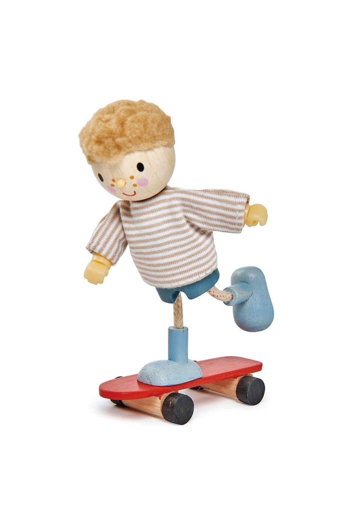 A wooden doll with a striped shirt balances on a red skateboard, showcasing bendable limbs and playful design.
