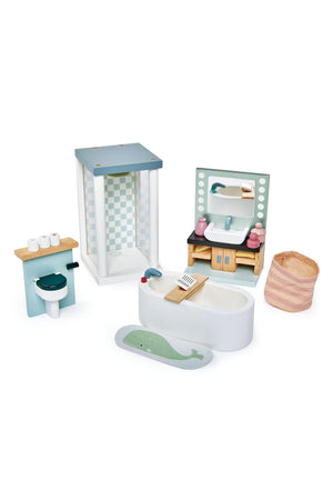 A colorful wooden dollhouse bathroom set featuring a bathtub, sink, shower, toilet, bath mat, and laundry bag.