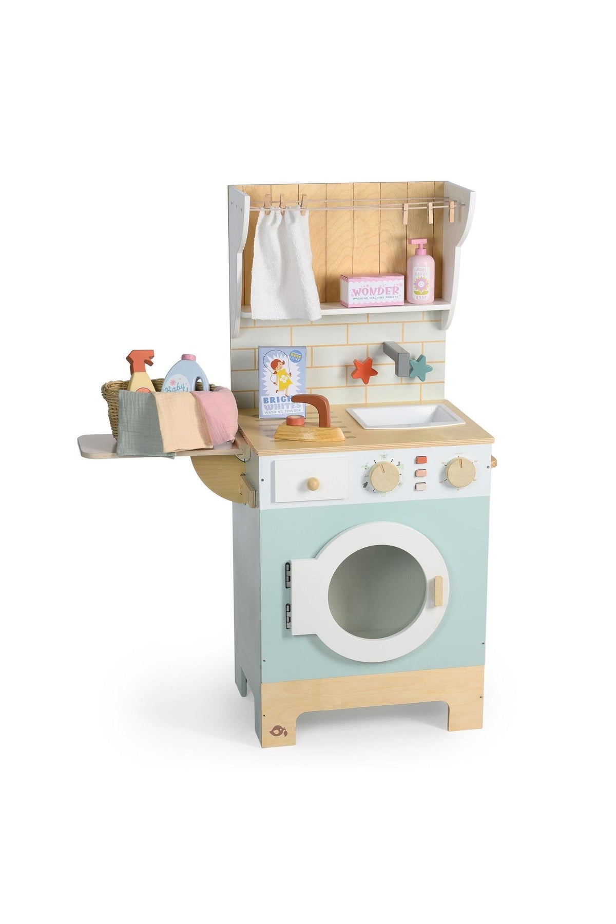 A colorful wooden laundrette playset featuring a washing machine with a white door, a countertop with accessories, and a charming wicker basket. Ideal for imaginative play and eco-conscious fun.
