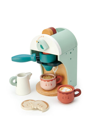 Tender Leaf Wooden Toys babyccino maker in soft colors, featuring two coffee cups, a milk jug, and playful biscuit shapes.