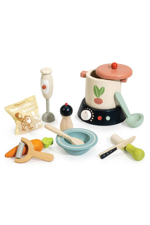 A colorful wooden soup maker set by Tender Leaf Toys, featuring a pot, utensils, and vegetables. The eco-friendly materials encourage imaginative play for young chefs aged three and up.