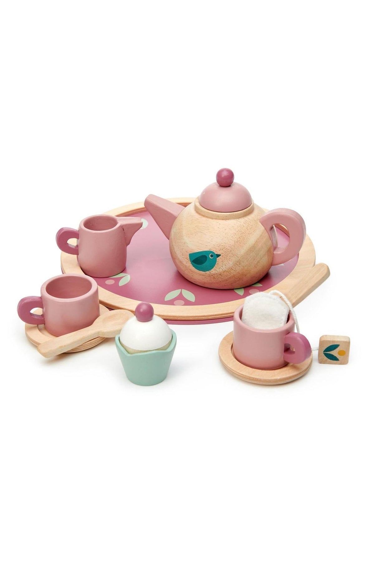 A wooden tea set by Tender Leaf featuring a pink and mint color scheme. It includes a teapot, cups, a milk jug, a cupcake, and a round tray, all crafted.