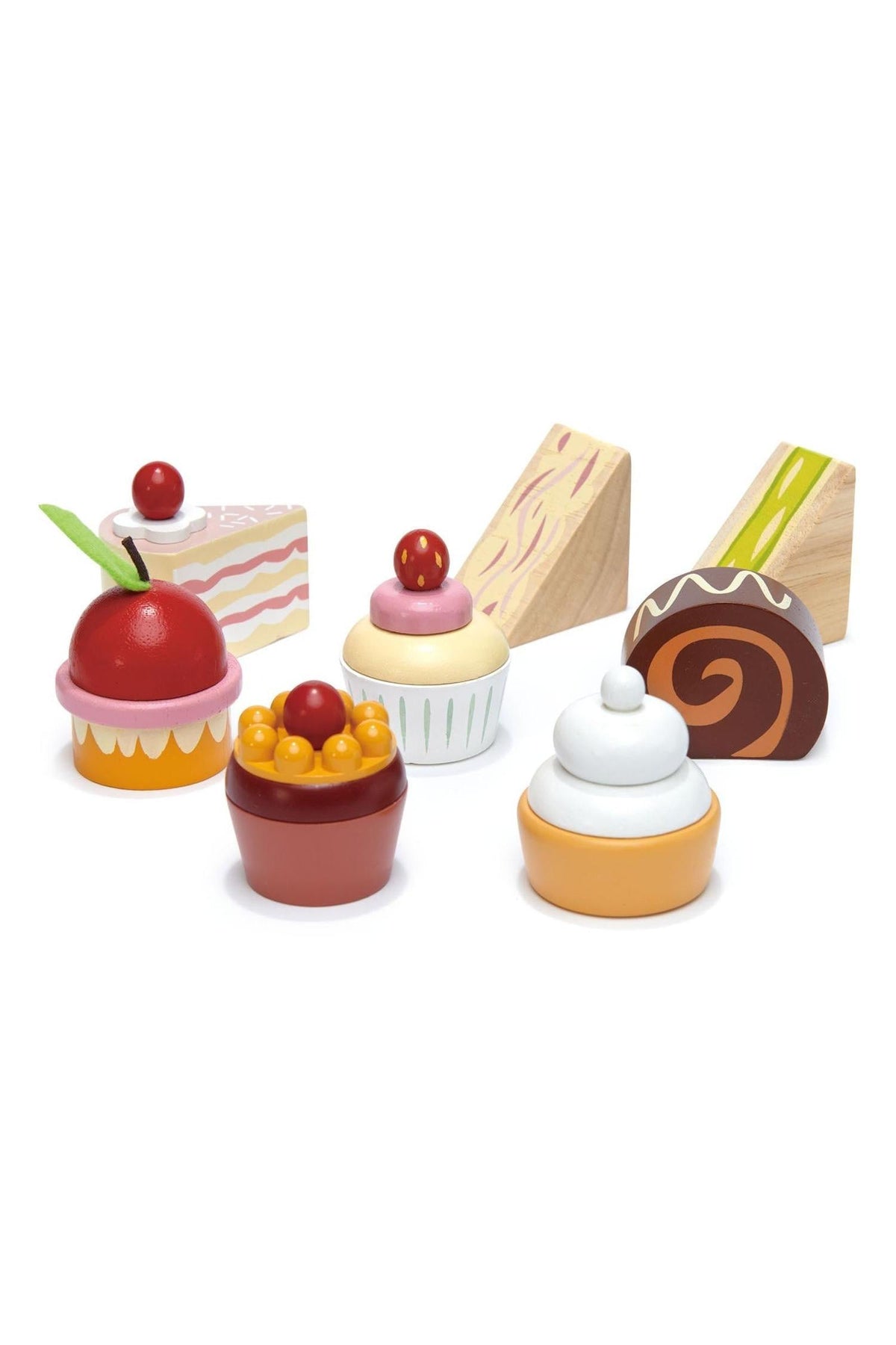Colorful wooden toy desserts from Tender Leaf, featuring cupcakes, a chocolate roll, and a slice of cake. These eco-friendly toys are designed for children ages 3 and up.