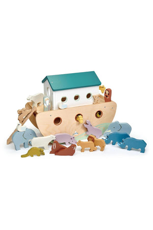 A colorful wooden ark with a teal roof features various animal figures, including elephants and lions, promoting imaginative play.