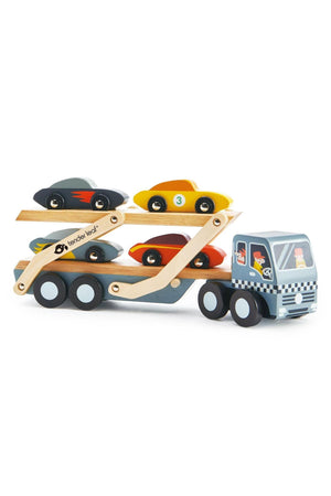 A colorful wooden car transporter by Tender Leaf features four stylish cars and a detachable ramp. The eco-friendly design is perfect for children aged three and up, ensuring safe play.