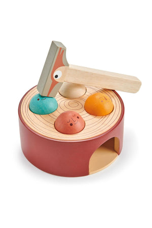 Colorful wooden hammer game by Tender Leaf, featuring a tree trunk base and smiling balls, designed for toddlers aged 18.