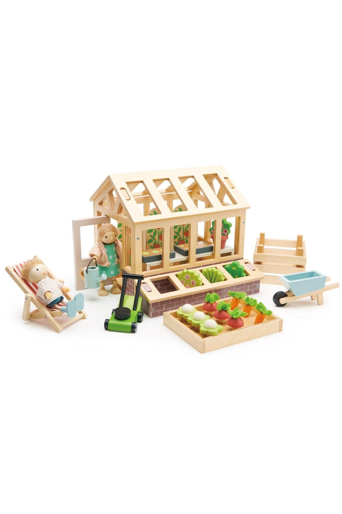 A wooden greenhouse set features a detailed structure with removable roof panels, surrounded by miniature garden accessories, including a wheelbarrow and plant boxes, perfect for imaginative play.