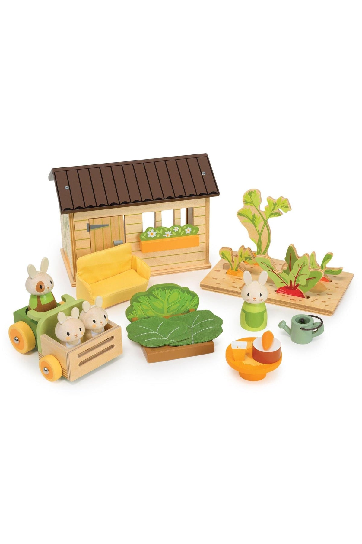 A wooden toy set features a charming garden scene with a shed, toy rabbits, and vegetables. Made from sustainable materials, it encourages imaginative play for young children.