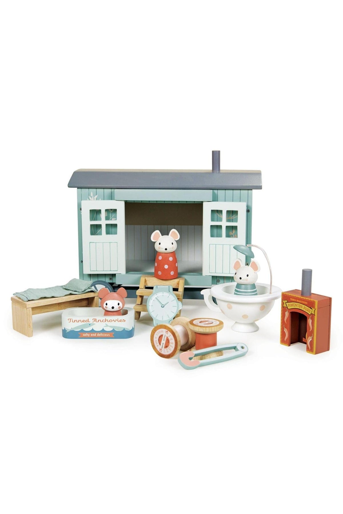 A colorful wooden shepherd’s hut features charming details like a teacup shower and thread spool chair, accompanied by playful mice figurines. This eco-friendly toy encourages imaginative play for young children.