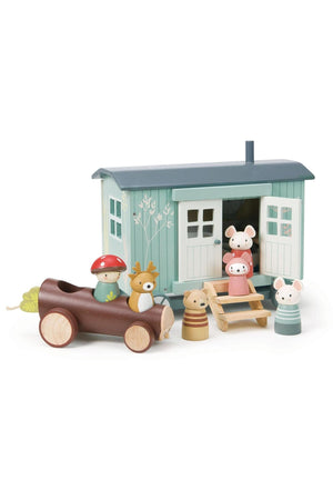 A colorful wooden shepherd’s hut features charming animal figures and a log toy. Crafted from sustainable materials, this imaginative playset encourages creative storytelling for young children.