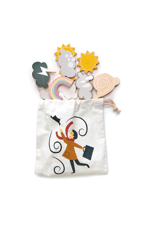 A natural canvas bag featuring a playful illustration of a person holding an umbrella contains colorful wooden weather-themed shapes, including suns, clouds, and a rainbow, perfect for educational play.