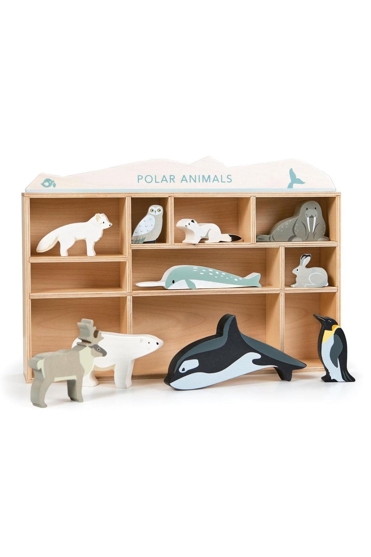 A wooden shelving unit displays ten colorful polar animal figures, including a walrus, orca, and king penguin, crafted from sustainable.
