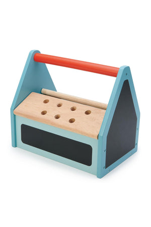 A colorful wooden toolbox from Tender Leaf Toys features a blue and red design with multiple holes for building activities.