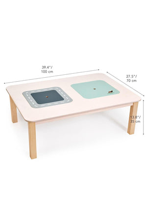 A spacious wooden play table with a light finish features two reversible lids: one with a road design and another in soft green. Ideal for toddlers creative activities.