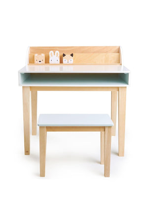 A wooden desk and chair set for toddlers features a natural wood finish with a white tabletop.