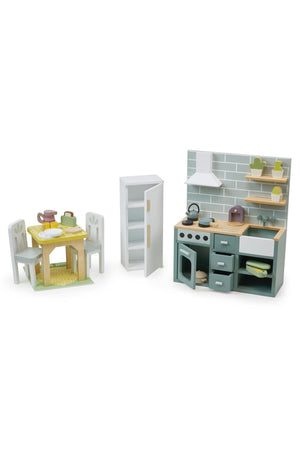 Wooden dollhouse kitchen set with table, chairs, fridge, and stove. Features pastel colors and is eco-friendly.