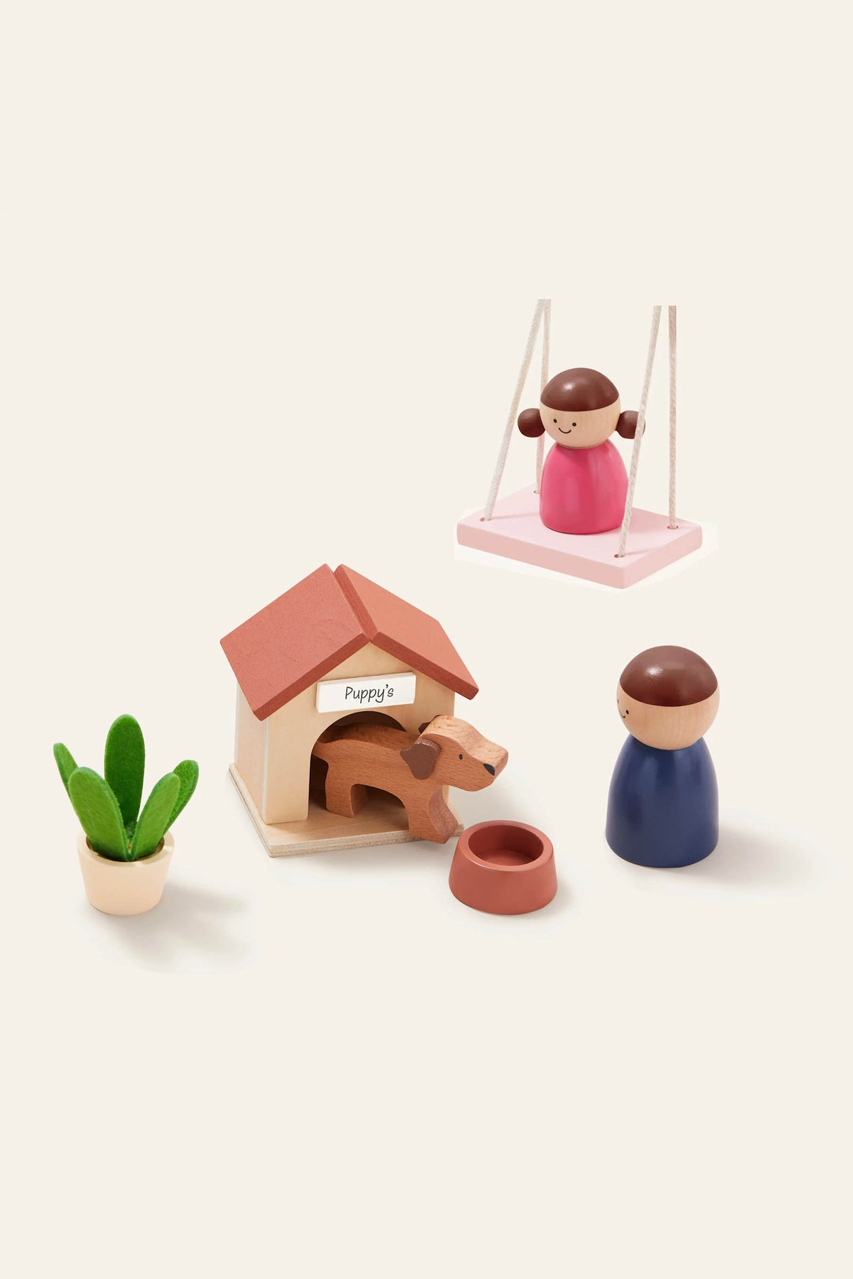 A colorful wooden playset features a doll on a swing, a doghouse with a dog, and a figure holding a bowl, all set against a light background for imaginative play.