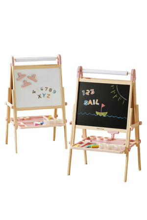 Children's easels with whiteboard and blackboard surfaces, surrounded by drawing tools on a checkered floor.