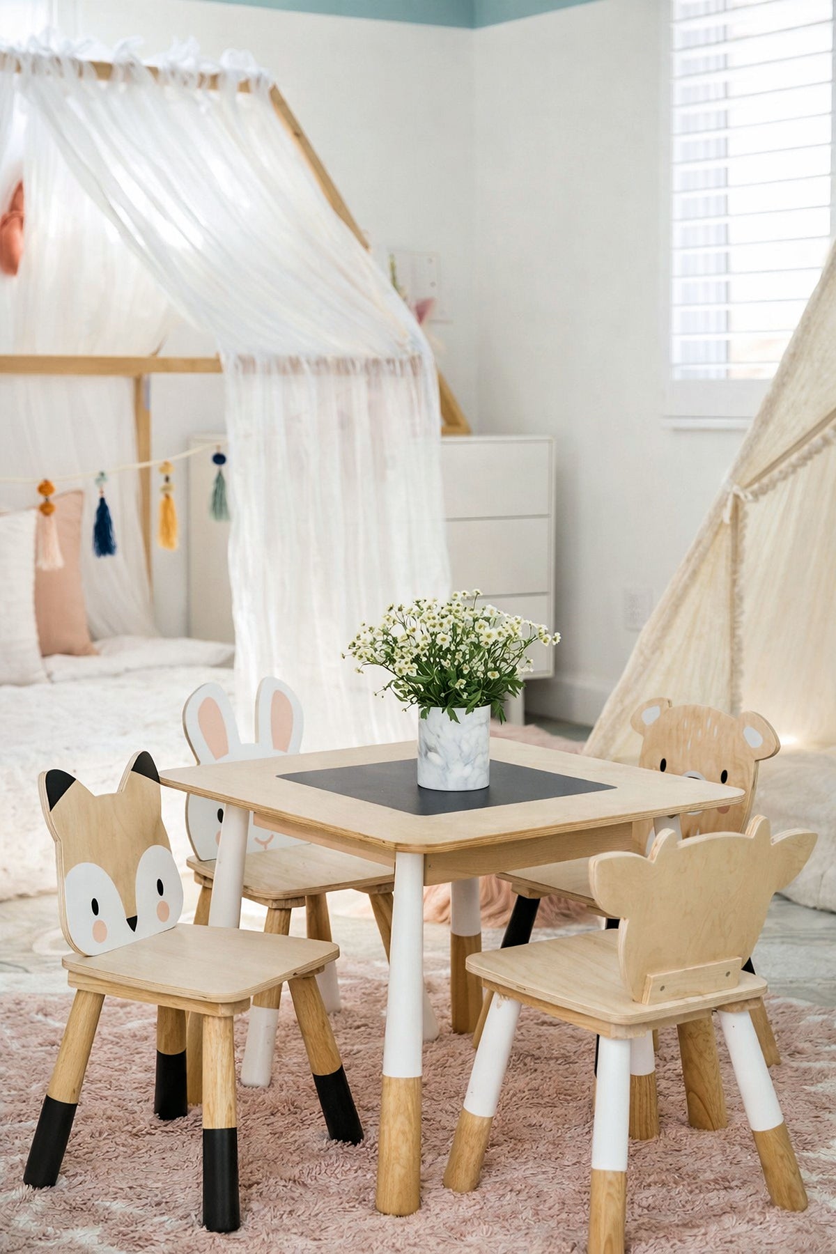 A wooden childrens table and chair set features animal-themed back panels, set in a cozy room with soft decor.