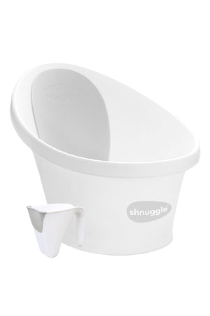 White Shnuggle baby bath with supportive backrest and matching rinse jug, designed for comfortable newborn bathing.