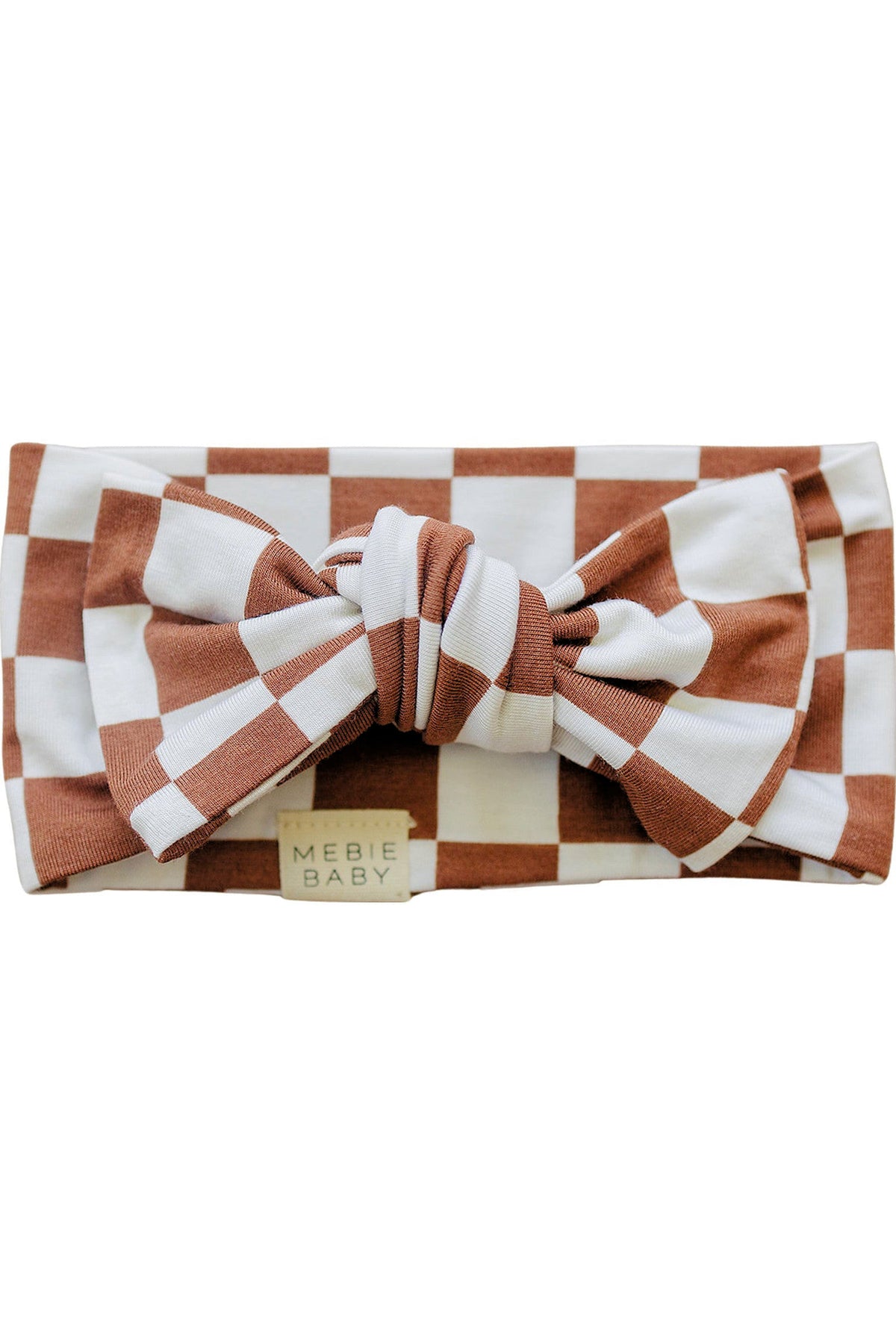 Rust checkered head wrap featuring a large bow, made of soft bamboo fabric, with a Mebie Baby tag visible.