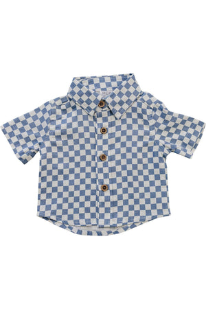 A blue checkered linen button-up shirt for boys, featuring a classic collar and wooden buttons. Ideal for ages 0-9, this stylish and comfortable shirt is perfect for warm weather.