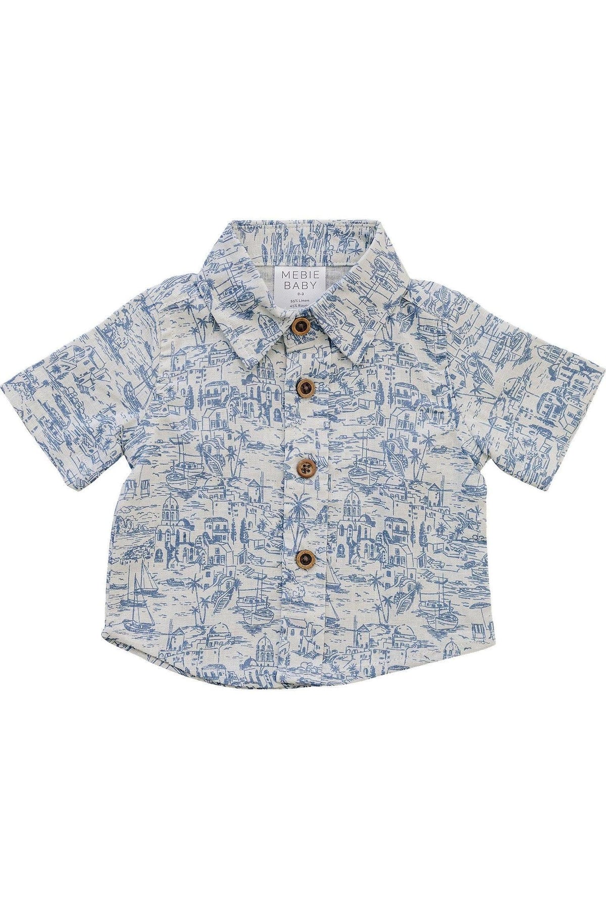Light blue and white linen button-up shirt from Mebie Baby features a playful coastal print and wooden buttons. Ideal for beach outings, it combines comfort and style for young boys.