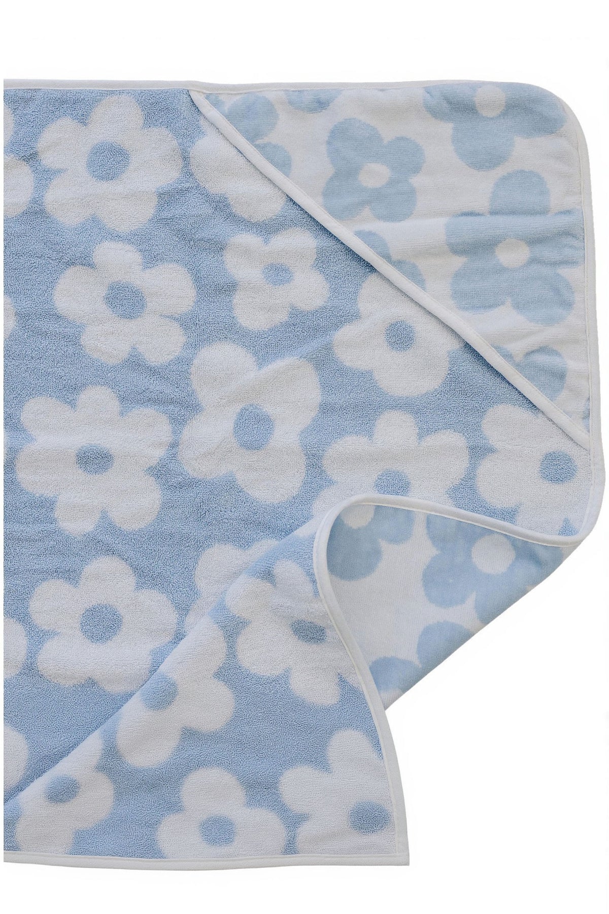 Light blue hooded towel featuring a floral pattern in white, made from soft, absorbent cotton. Ideal for keeping children warm and dry after bath time or beach outings.