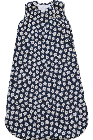 A navy sleep sack featuring a delicate daisy print, made from soft bamboo fabric. This cozy, breathable wearable layer is designed for babies to ensure comfort and warmth.