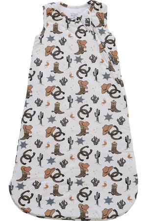 A soft bamboo sleep sack featuring a playful cowboy print, including hats, boots, and stars. This breathable, organic fabric is perfect for keeping babies cozy day and night.