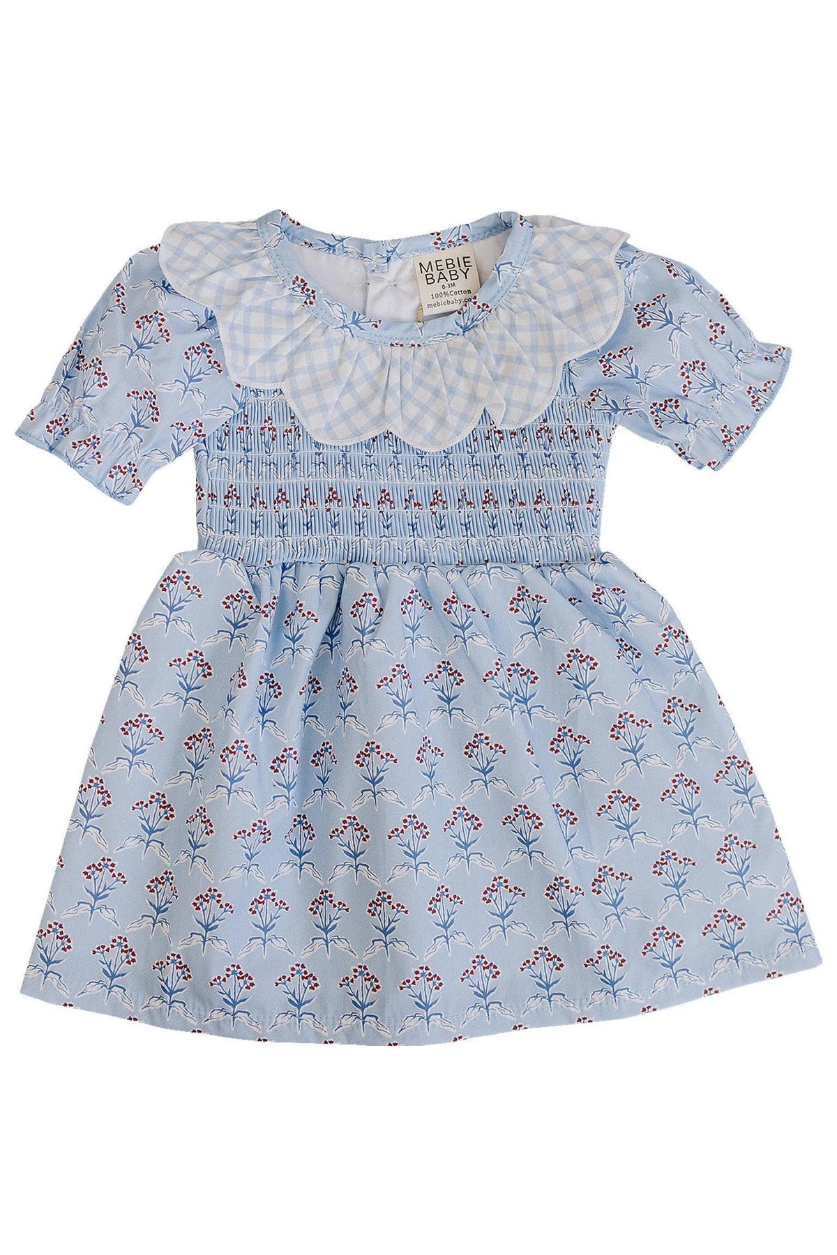Light blue cotton dress featuring a gingham collar and delicate red floral patterns. Designed by Mebie Baby, this playful dress is perfect for twirling and everyday adventures.