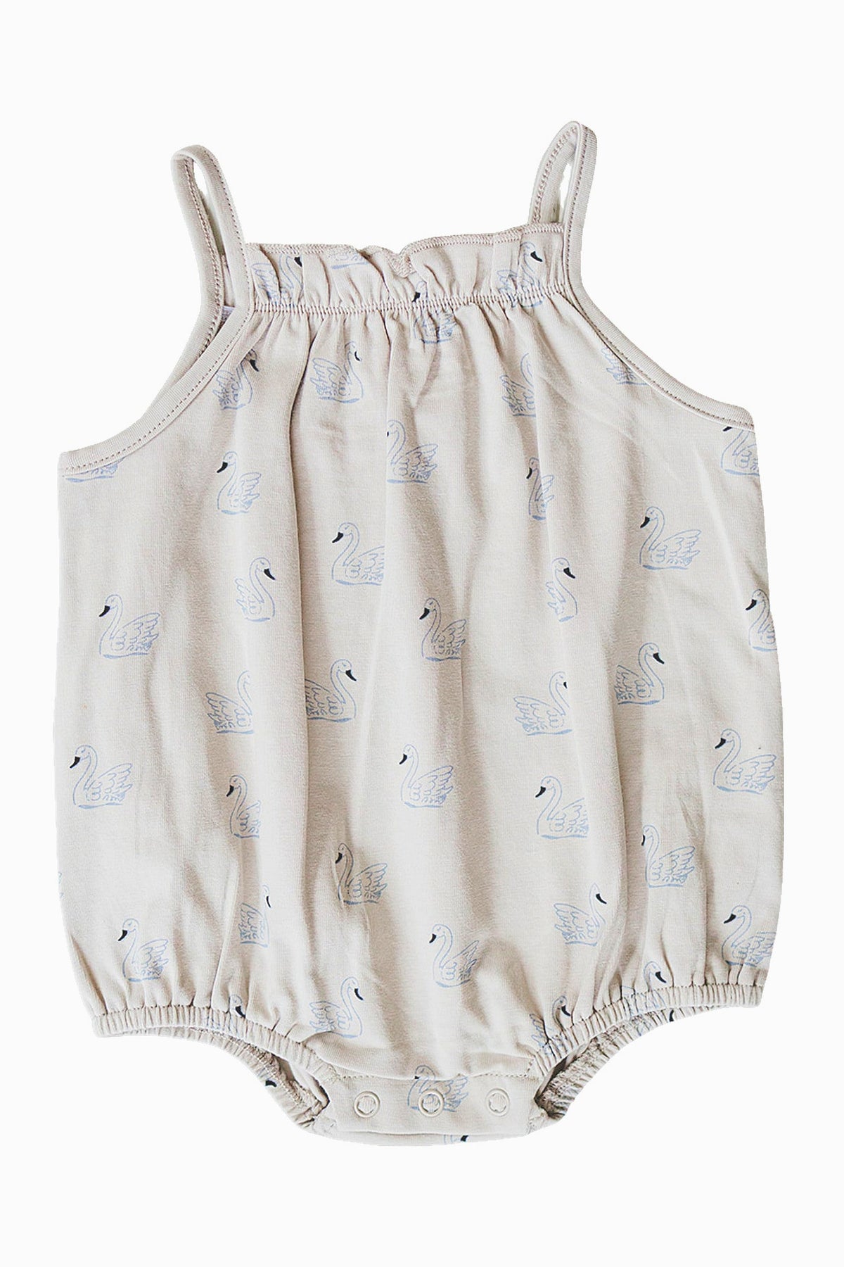 Cream tank bubble romper featuring a swan print, made from soft cotton fabric with elasticized leg openings and snap closures.