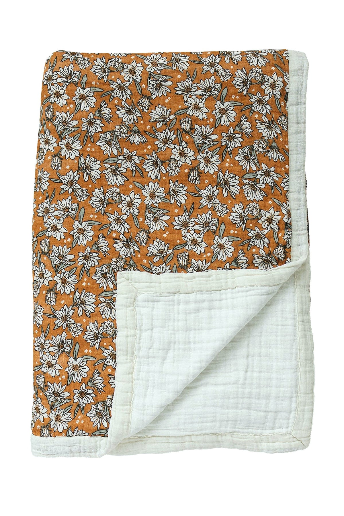 A twin quilt featuring a vibrant orange background with delicate white floral patterns and a soft, textured white underside.