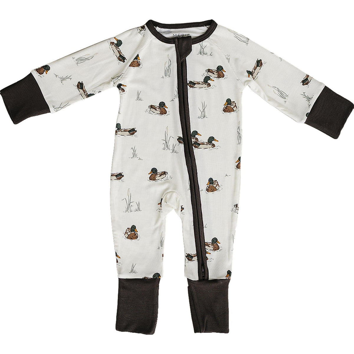 A ribbed bamboo zipper pajama features a playful duck pattern on a light background, with dark brown cuffs and foot openings, designed for comfort and easy diaper changes for babies.