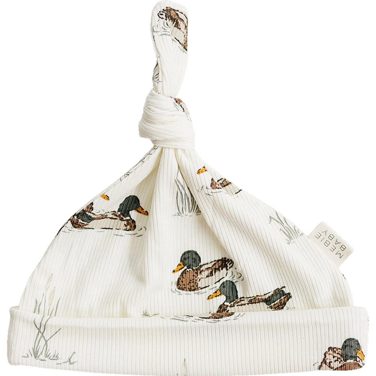 A soft, ribbed bamboo newborn knot hat featuring a charming duck print. This eco-friendly hat provides gentle comfort and warmth for newborns, making it an ideal baby essential.