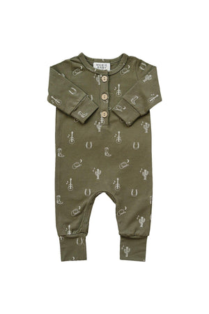 Olive green baby romper with western-themed illustrations, long sleeves, and wooden buttons. Made from organic cotton.