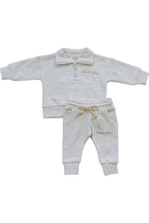 Grey quarter zip sweatshirt and pants set for babies by Mebie Baby, featuring Good Vibes text.