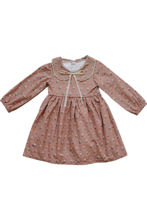 Pink floral cotton dress with long sleeves, lace-edged Peter Pan collar, and a bow at the neckline.