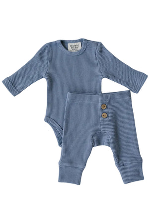 Dusty blue waffle knit cotton baby set featuring a long sleeve bodysuit and relaxed fit pants. The outfit is designed for comfort and style, perfect for infants and toddlers.