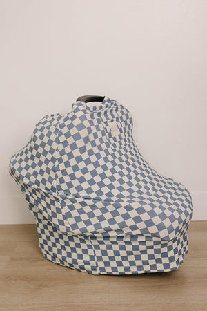 Blue checkered cover on a car seat, made from ribbed bamboo fabric, set against a light background.